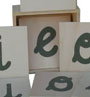 Vocales de lija en estuche de madera (xango) 